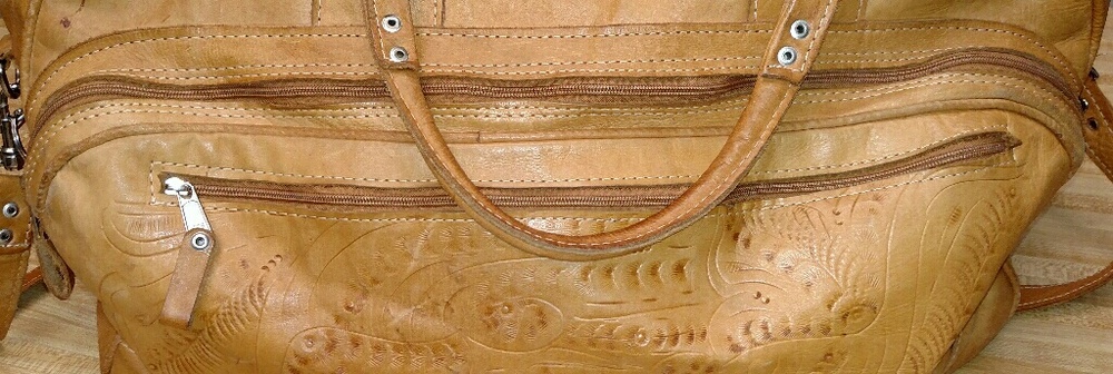 American west embroidered leather duffel bag
